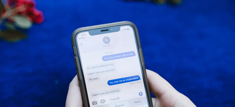 Stock photo: thumbs typing a message on a smartphone